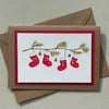 Christmas card, Red stockings that can be personalised with up to 6 letters