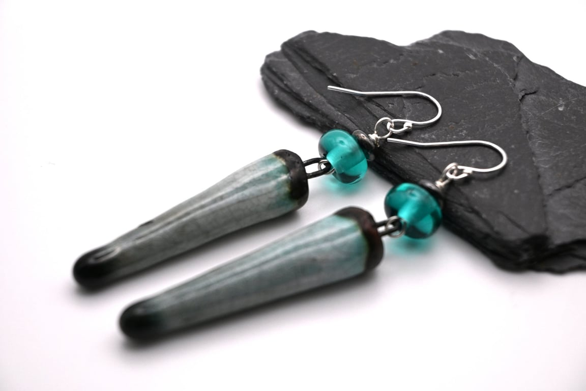 teal lampwork glass and ceramic spike earrings