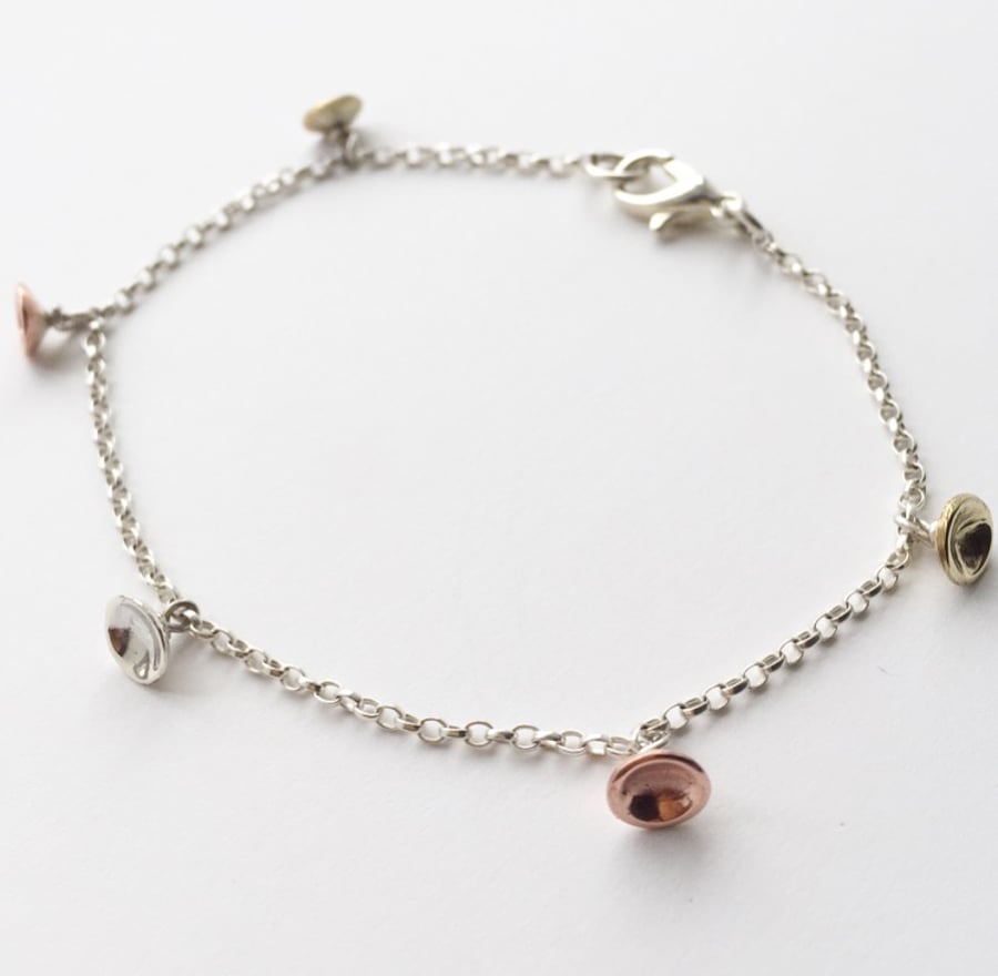 Dot charm bracelet Sterling silver, brass and copper