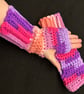 Hand Crocheted Fingerless Wrist Warmers in Vibrant Orange Pink and Purple - Image 1