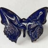 large brooch - butterfly scrolled white and purple on blue