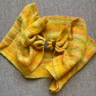 Woven cowl indie dyed yarn in yellow with a sunflower embroidery design