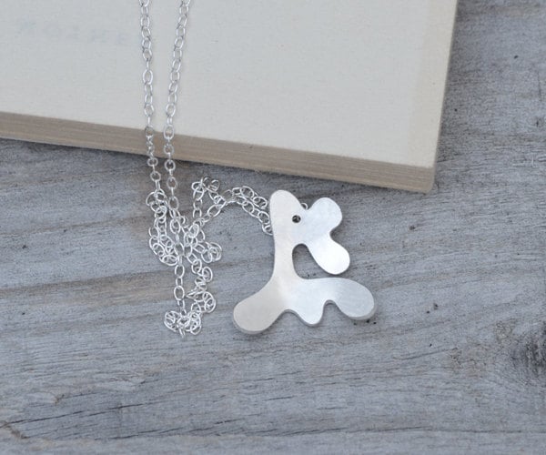 abstract deer necklace in sterling silver