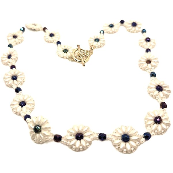 White daisy chain necklace with dyed haematite beads