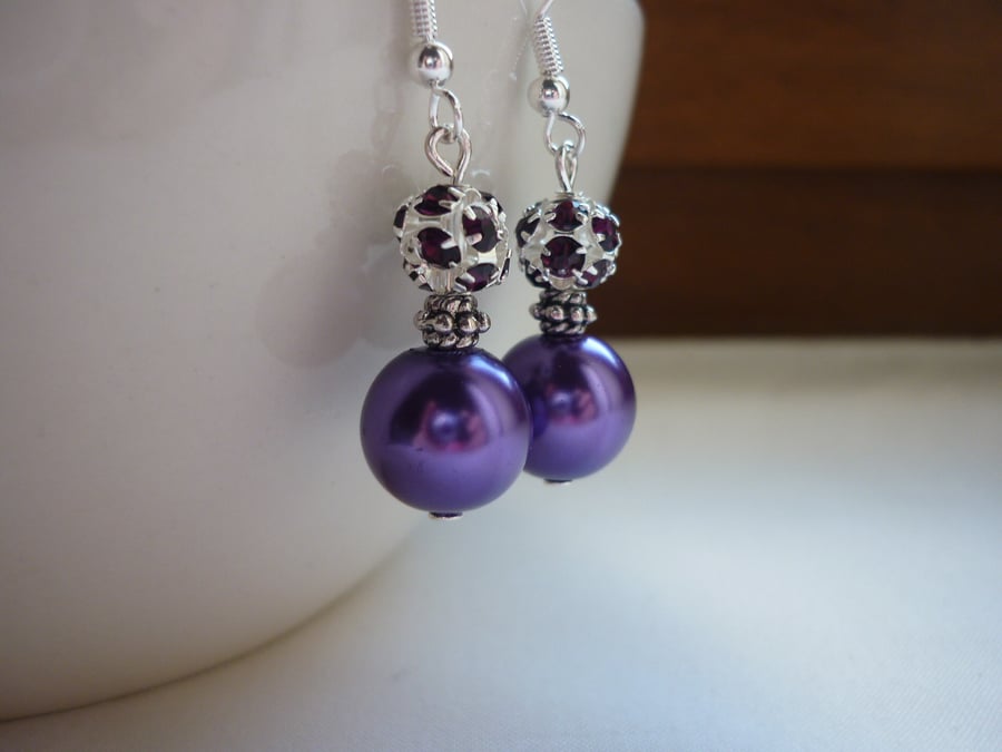 PURPLE AND SILVER RHINESTONE EARRINGS.  622