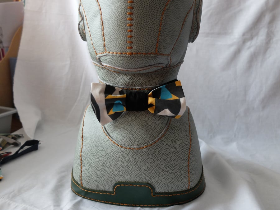 Hand made bow tie in board games fabric