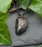 Simple Copper Wire Wrapped Black Pebble Pendant - Image 1