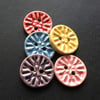 Set of five little handmade ceramic buttons