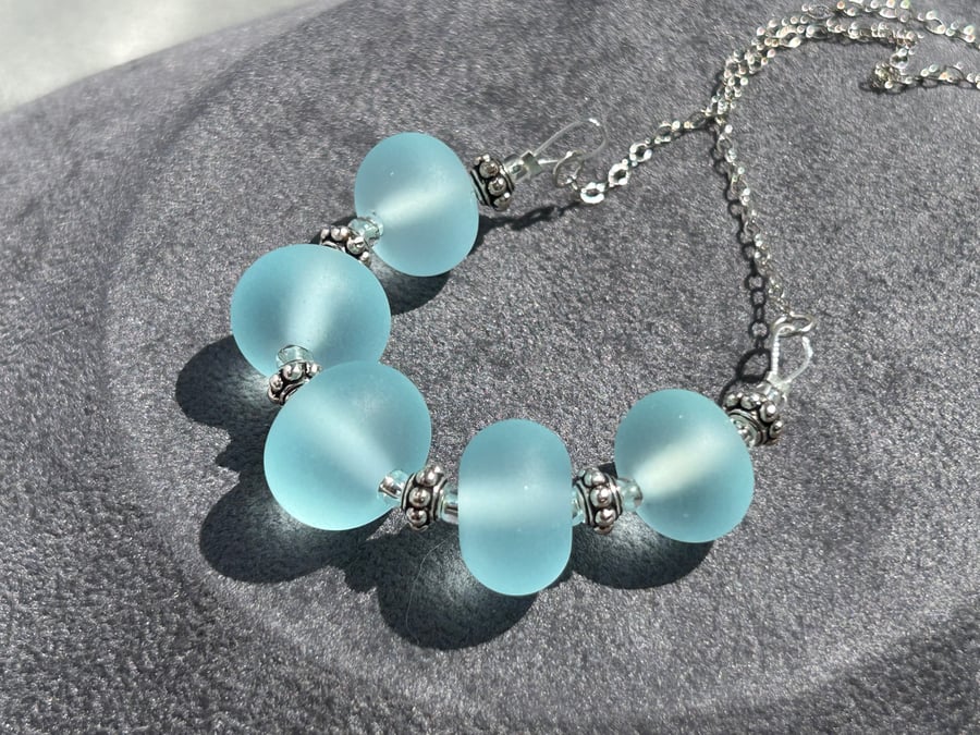 blue seaglass etched effect lampwork glass beaded necklace and earring set