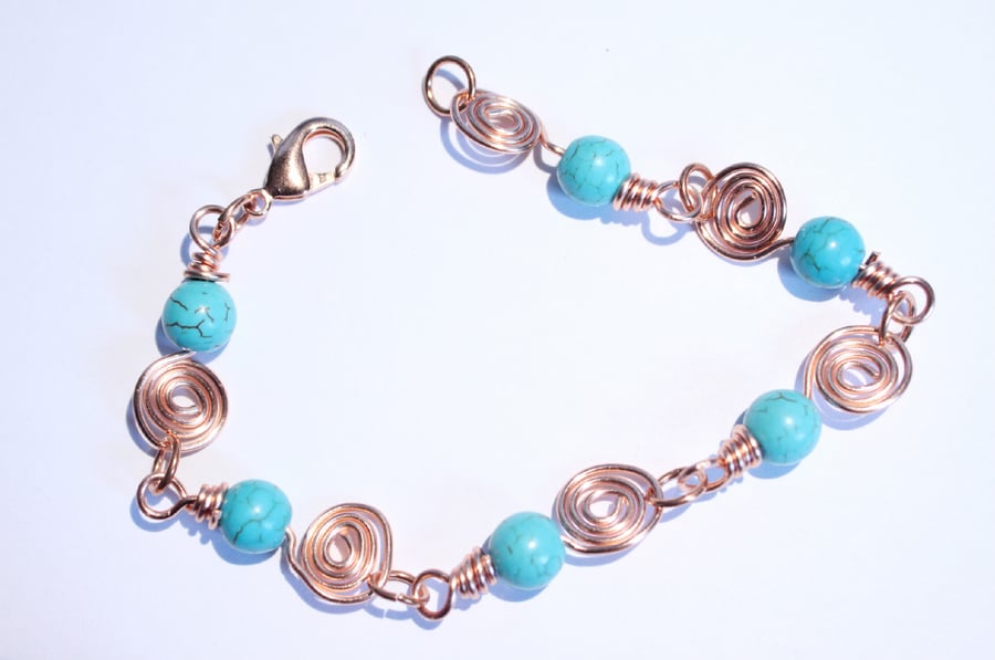 Turquoise and copper spirals bracelet