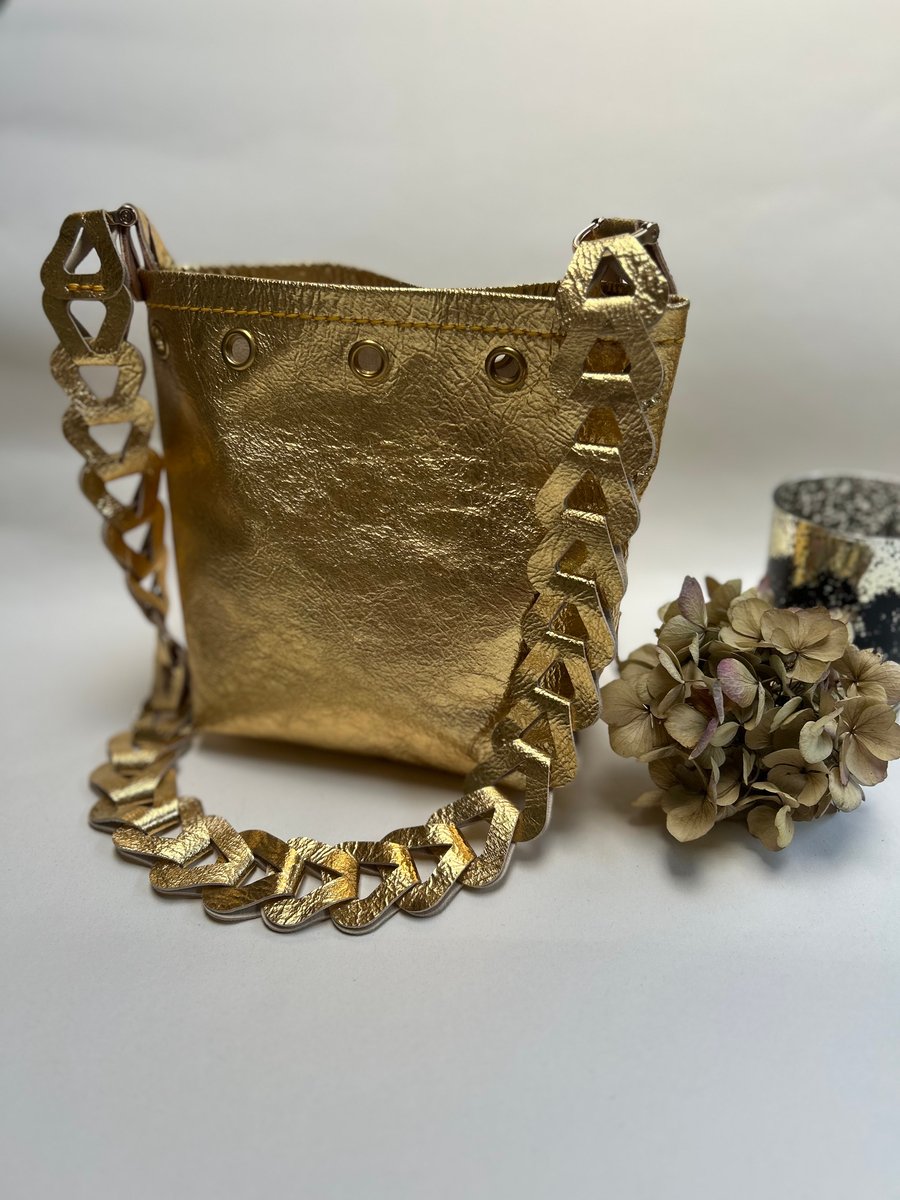 Gold leather bucket bag 