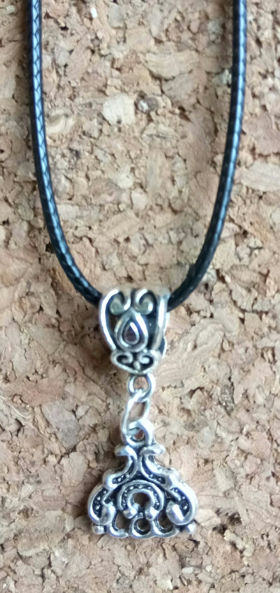 Traditional Tibetan Charm on a Leather Necklace