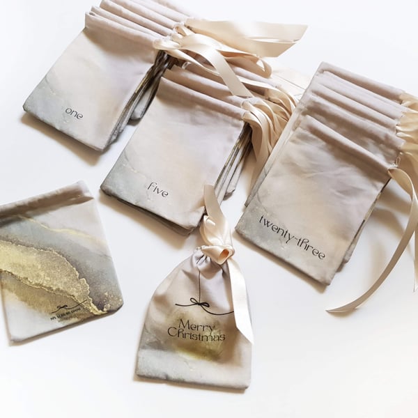 Neutral beige and gold 'Merry Christmas' Advent Calendar pouches