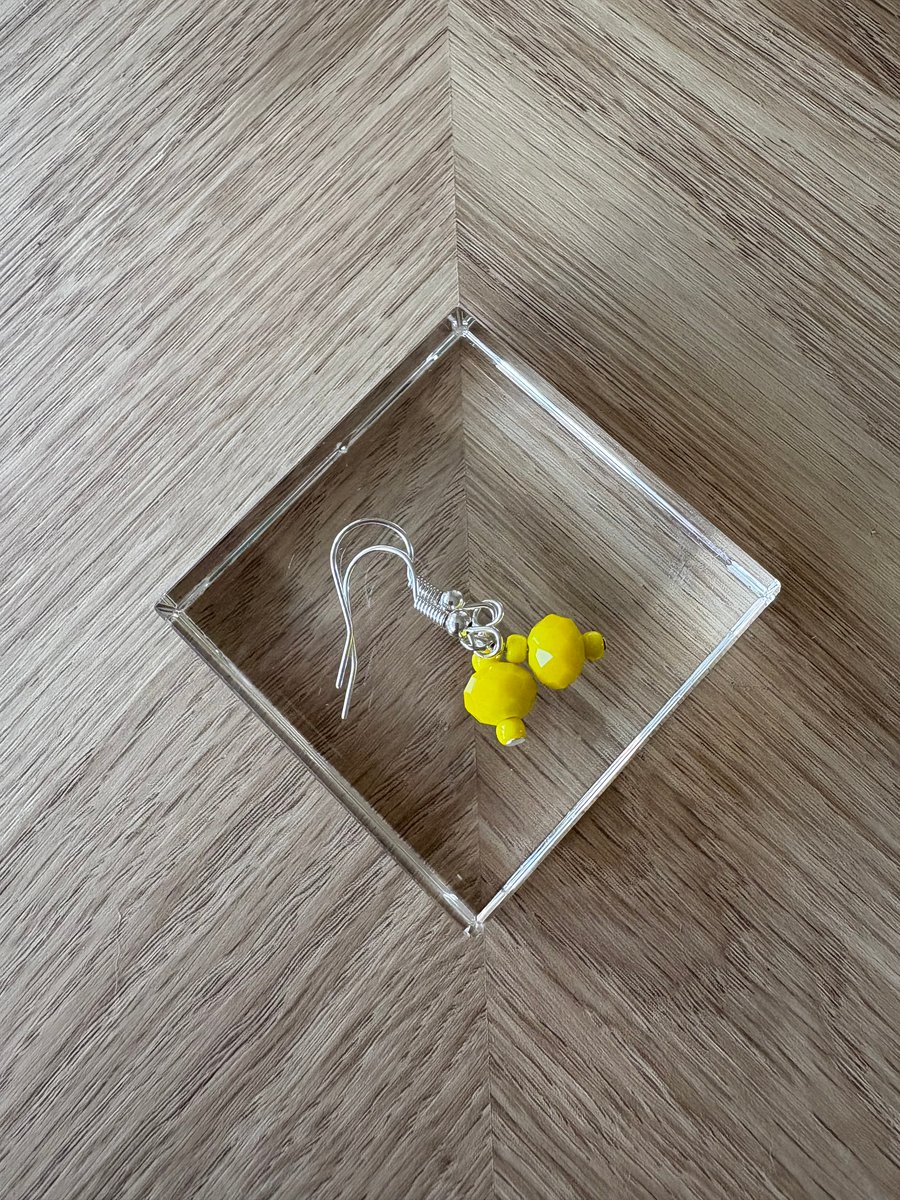 Bright yellow earrings