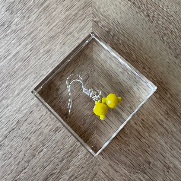 Bright yellow earrings