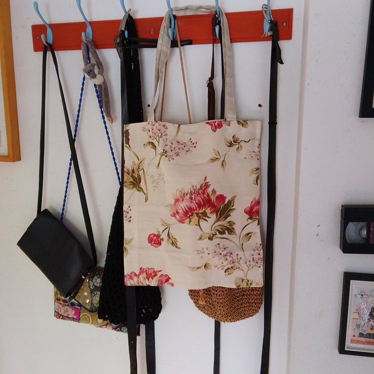Tote bag made from cream fabric with red floral pattern