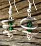 Drop earrings with small green beads and silver discs - Image 1