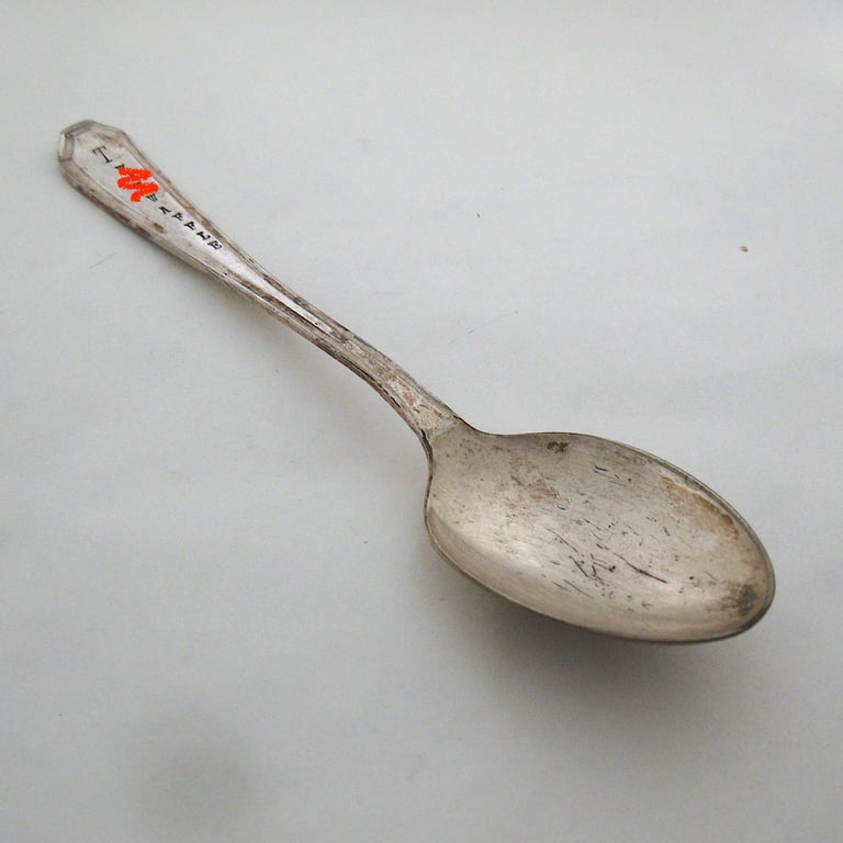 Very rude word handstamped old spoon