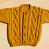 hand knitted cable baby cardigan 6 to 12 months in mustard