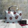 Handmade Oilcloth Light Blue Grab Bag with Large Flower Design