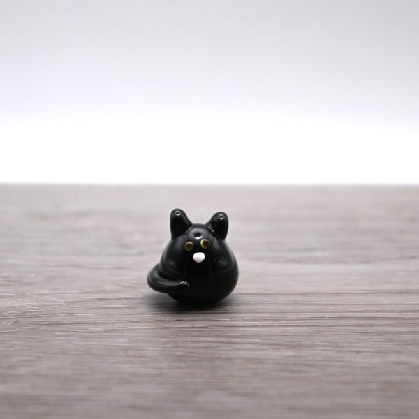 small black glass cat figure