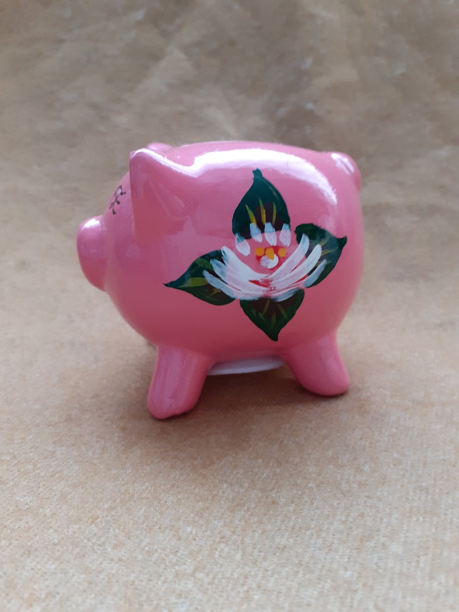 Pink piggy bank with canal art style roses
