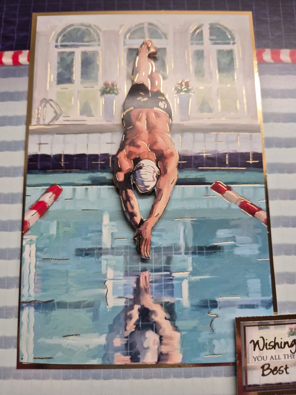 Male swimmer, diving into a swimming pool 