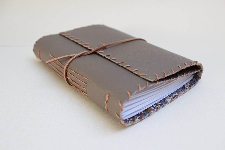 A6 Fold Over Brown Leather handmade notebook floral fabric lining plain paper 