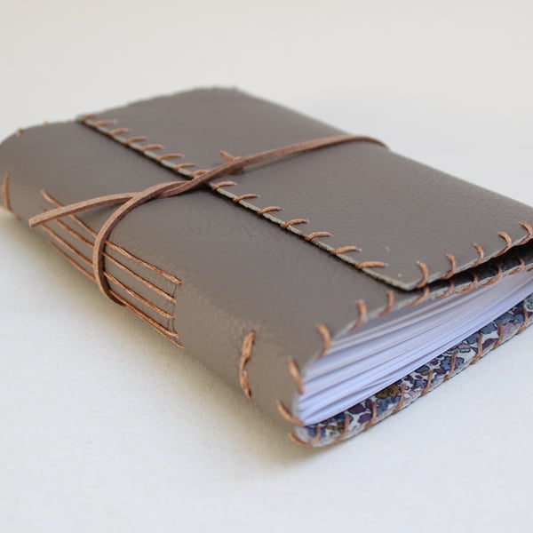 A6 Fold Over Brown Leather handmade notebook floral fabric lining plain paper 