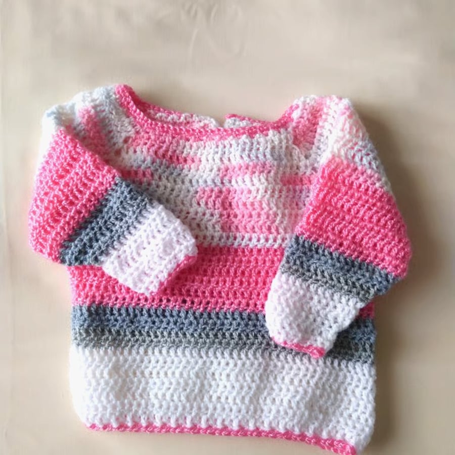 Pink and grey crochet baby jumper. Unique gift for new baby girl