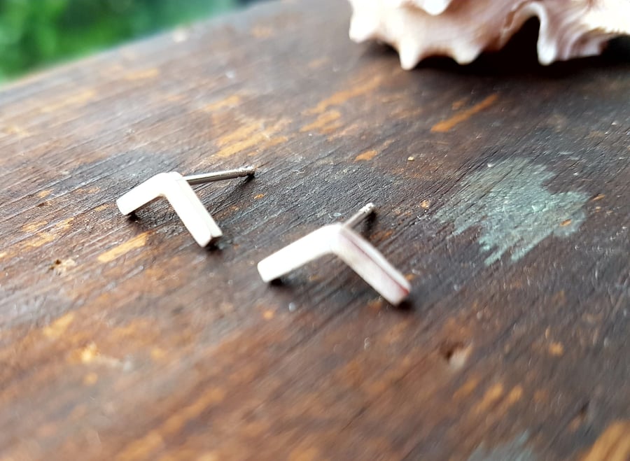 Handmade silver chevron studs in sterling silver with silver post and scrolls
