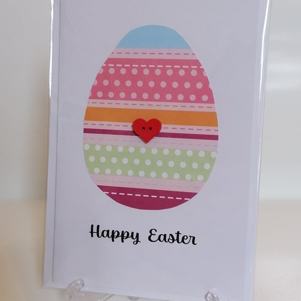 Happy Easter - pink striped Easter egg with a heart button greetings card 