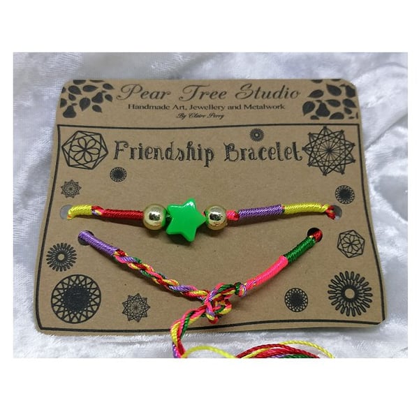 Friendship bracelet with Green star bead.