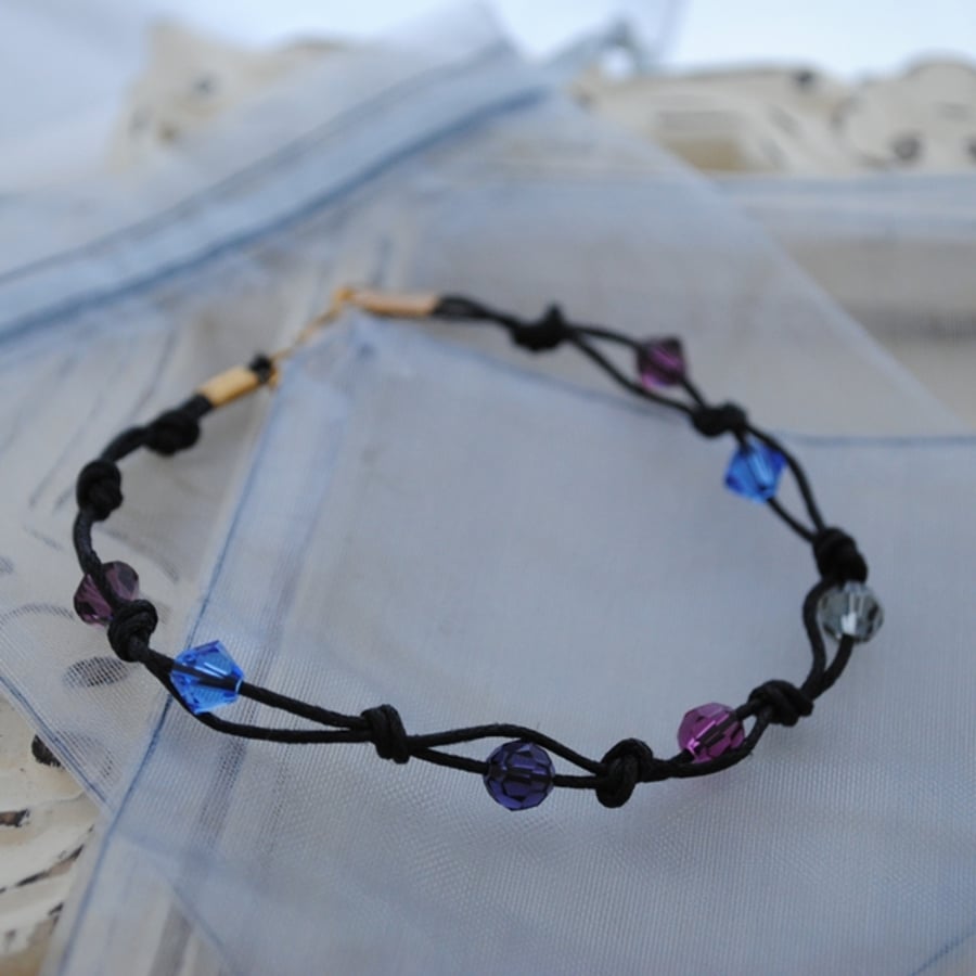 Swarovski crystal & black cord bracelet, blue, sapphire, purple, fuchsia