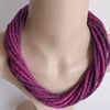 The Twist: felted cord necklace in shades of pinky purple