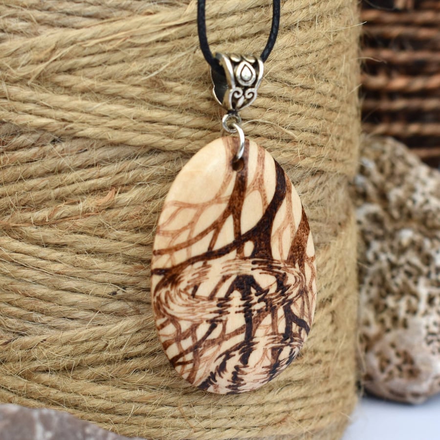 Trees in reflection. Pyrography wooden teardrop pendant. Hand burned wood gift. 