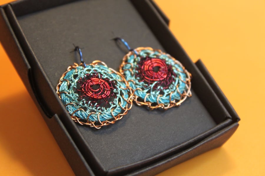Blue and red disc earrings from recycled materials