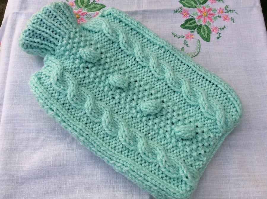 Knitted Hot Water Bottle Cover in aqua, warm toes all year