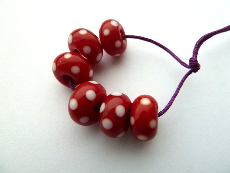 red spotty lampwork glass beads