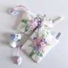 Make up bag or purse recycled in a vintage pastel floral embroidered tray cloth