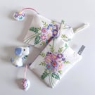 Make up bag or purse recycled in a vintage pastel floral embroidered tray cloth