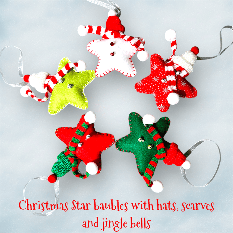 Christmas star hanging decorations baubles in woolly hats, scarves, jingle bells
