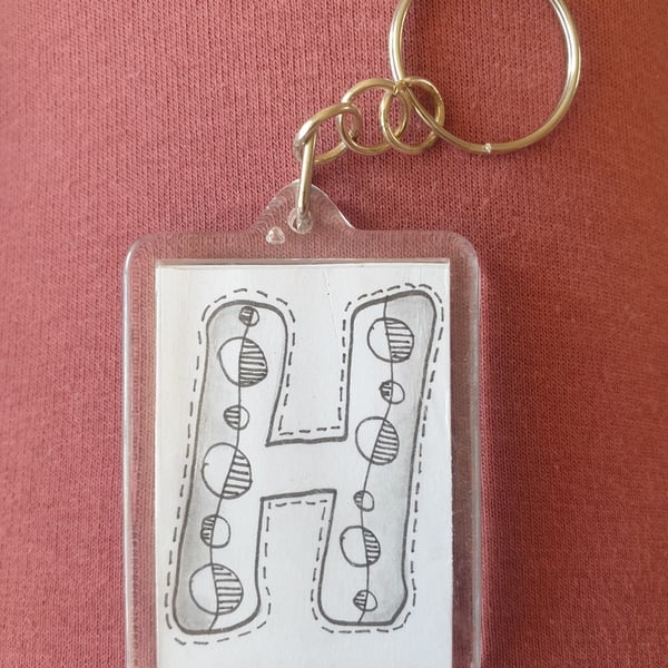 Hand drawn initial "H" keyring.