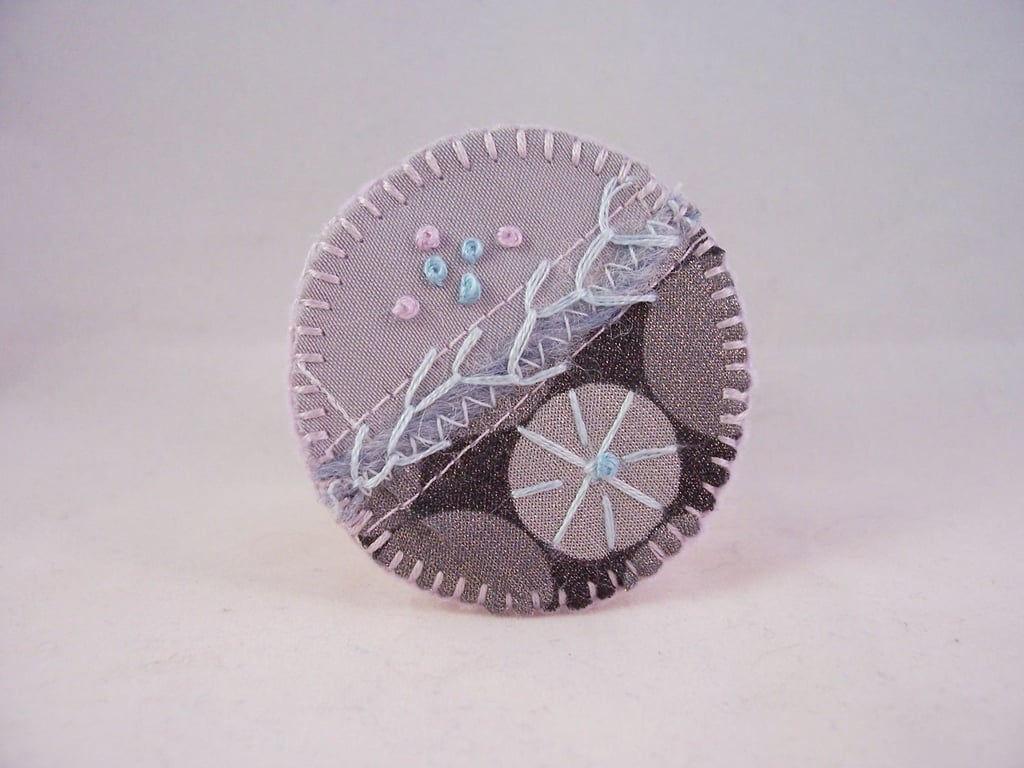 Hand embroidered mixed fabric brooch 