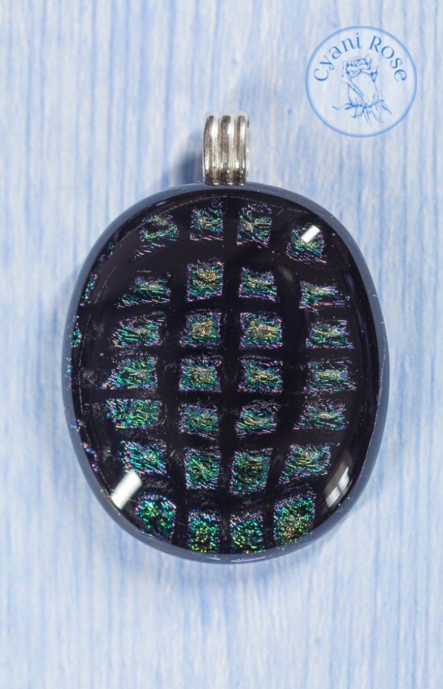 Beautiful dichroic fused glass pendant black peacock feather colours
