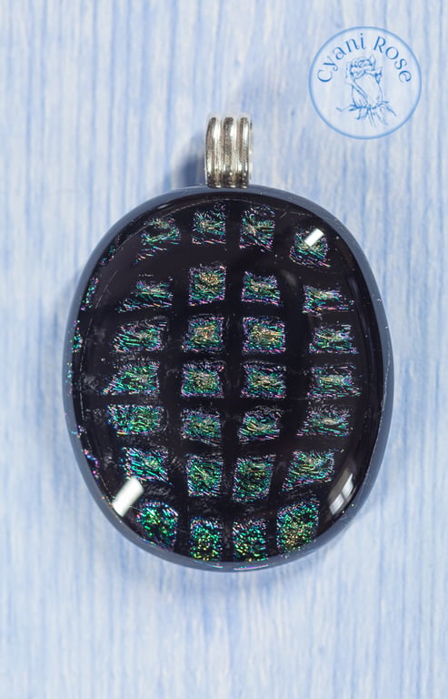 Beautiful dichroic fused glass pendant black peacock feather colours