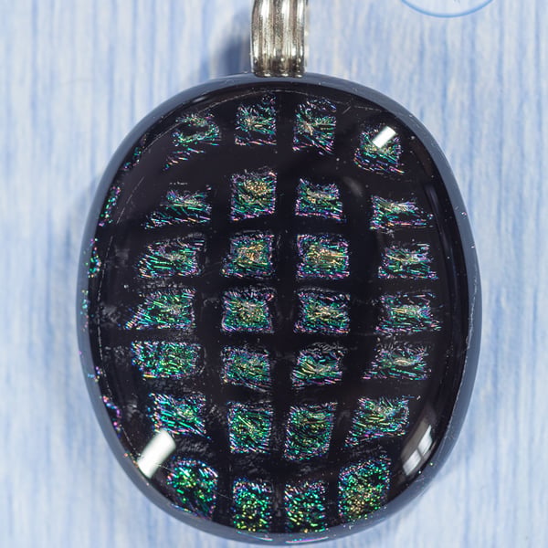 Beautiful dichroic fused glass pendant black peacock feather colours