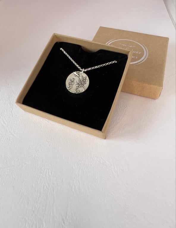 Silver wild flower textured pendant necklace