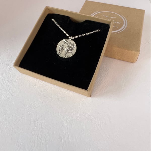 Silver wild flower textured pendant necklace