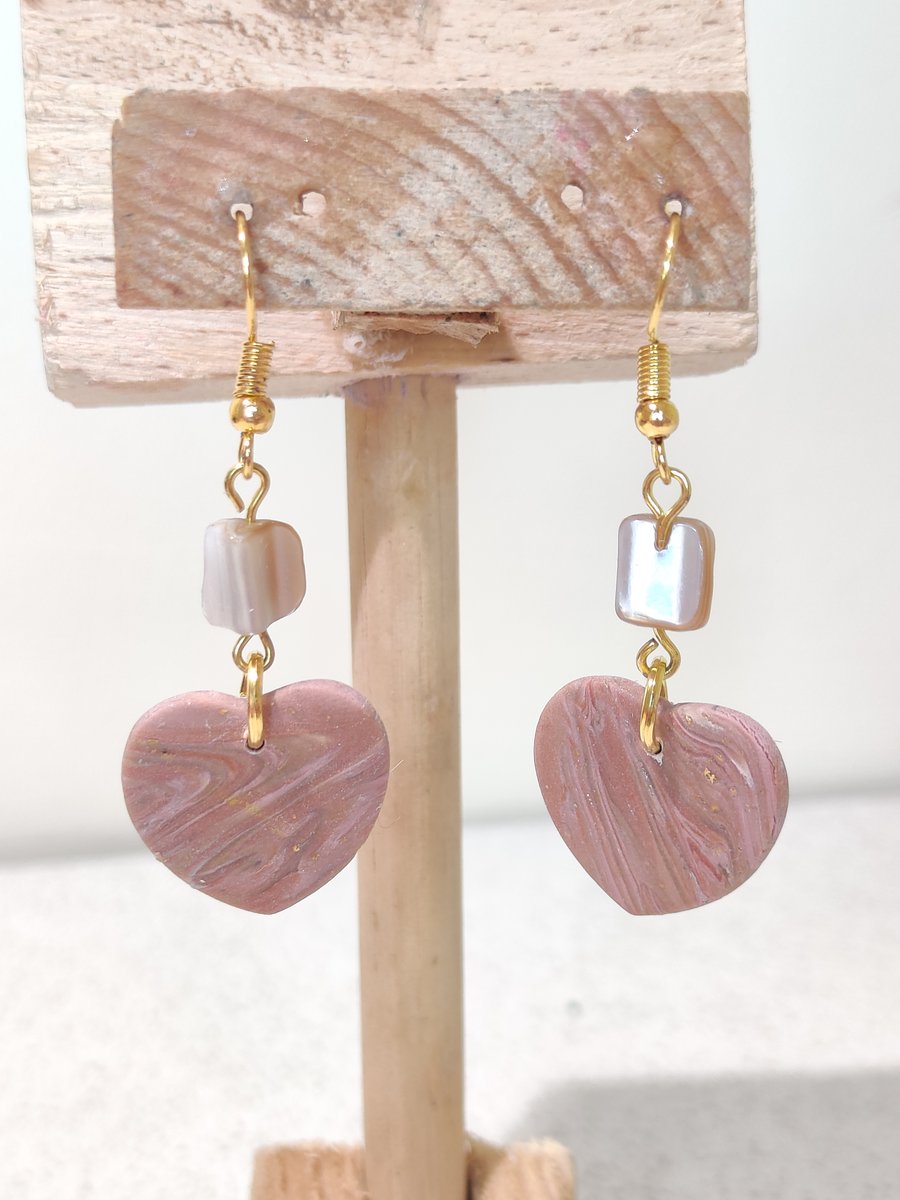 Pink swirl heart dangle earrings